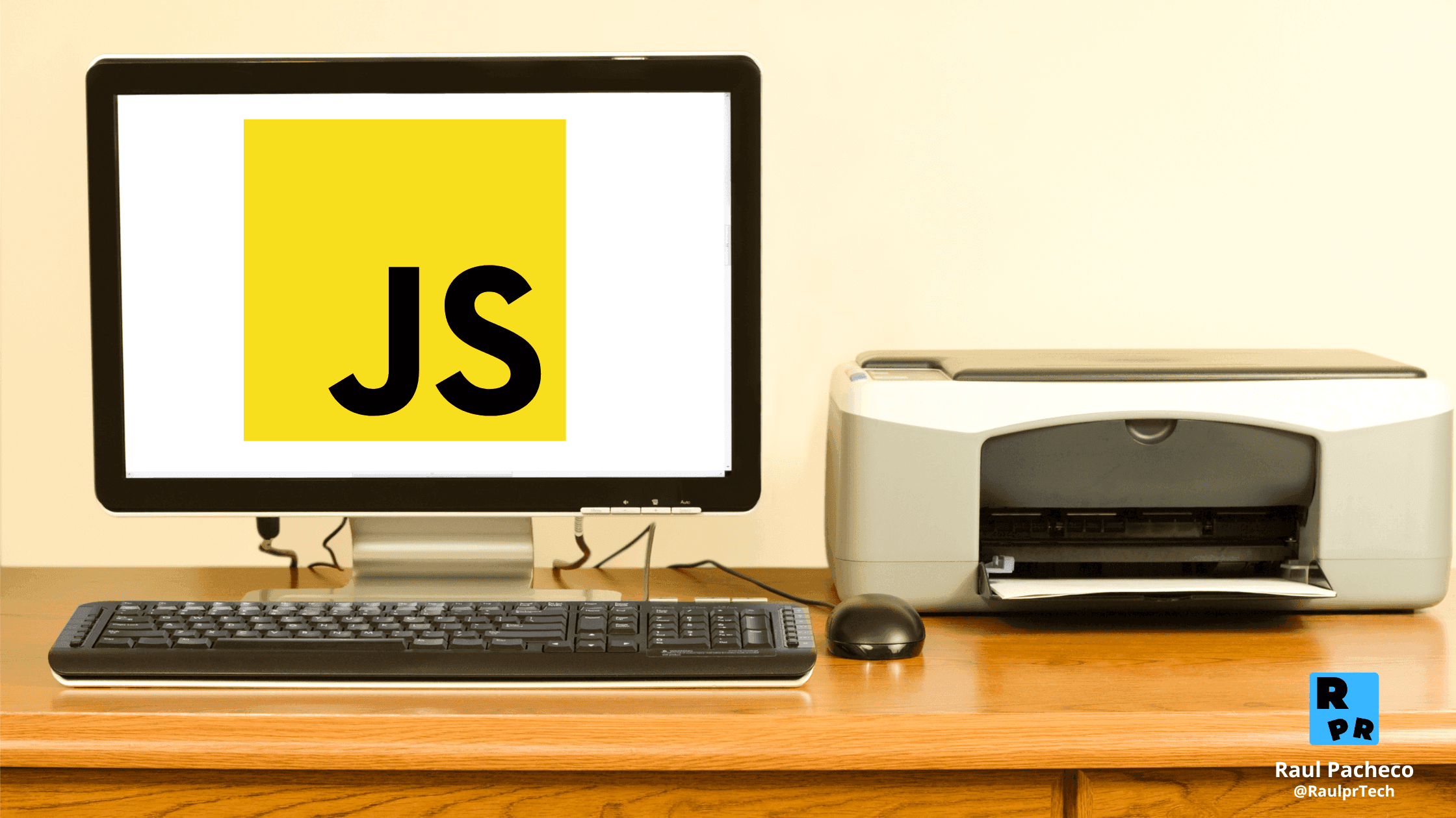 Desarrollo de software de Escritorio - Computadora de escritorio con el logo de JavaScript en la pantalla